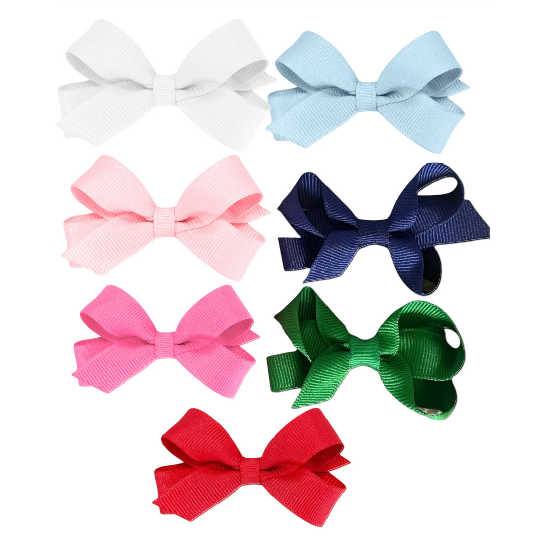 That Store set of seven assorted colorful grosgrain ribbon hair bows with patented no-slip alligator clips