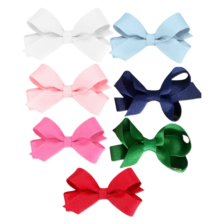 That Store set of seven assorted colorful grosgrain ribbon hair bows with patented no-slip alligator clips