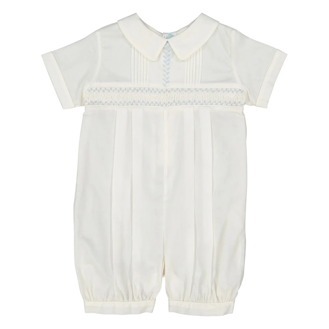 That Store ivory baby boy romper with hand-stitched pintucks, embroidery, and French lace collar detail.