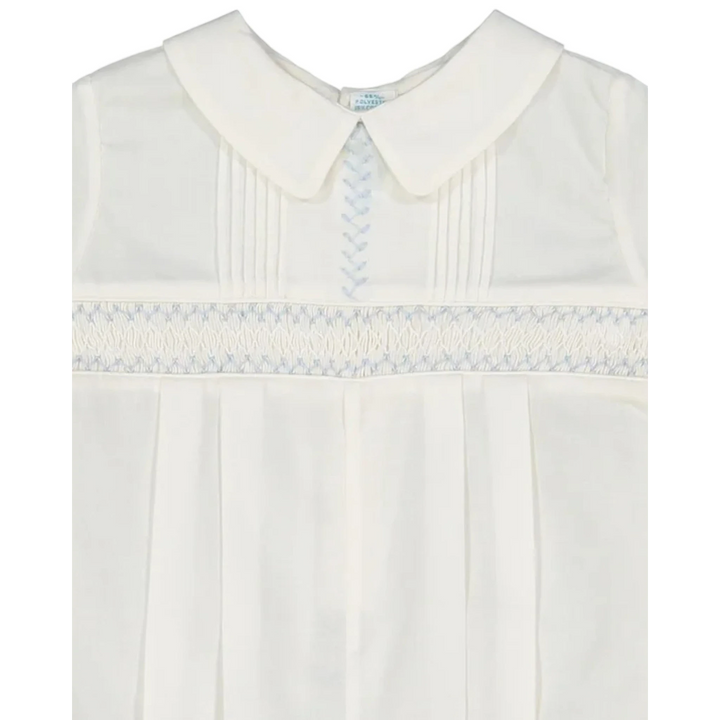 That Store ivory baby boy romper with hand-stitched pintucks, blue embroidery, and a classic Peter Pan collar.
