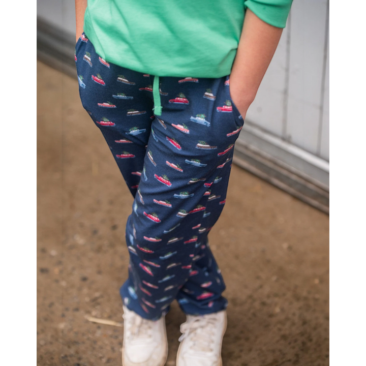 That Store kids blue lounge pants featuring a festive holiday car print with a comfortable elastic waistband