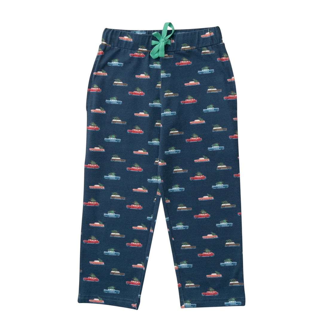 That Store kids lounge pants in navy blue with a festive holiday car and Christmas tree print and green drawstring.