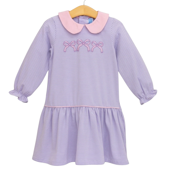 That Store lavender striped long-sleeve dress with a pink Peter Pan collar and bow embroidery on the bodice.