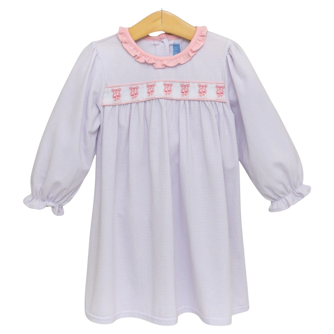 That Store lavender windowpane dress with pink ballet shoe embroidery, ruffled collar, and long sleeves.