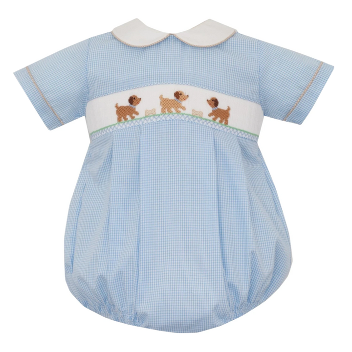 That Store light blue gingham boys bubble with hand-smocked puppy embroidery and a white peter pan collar.