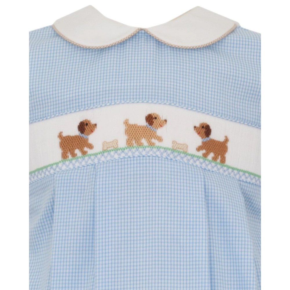 That Store light blue gingham boys bubble with hand-smocked puppy embroidery and a white Peter Pan collar.