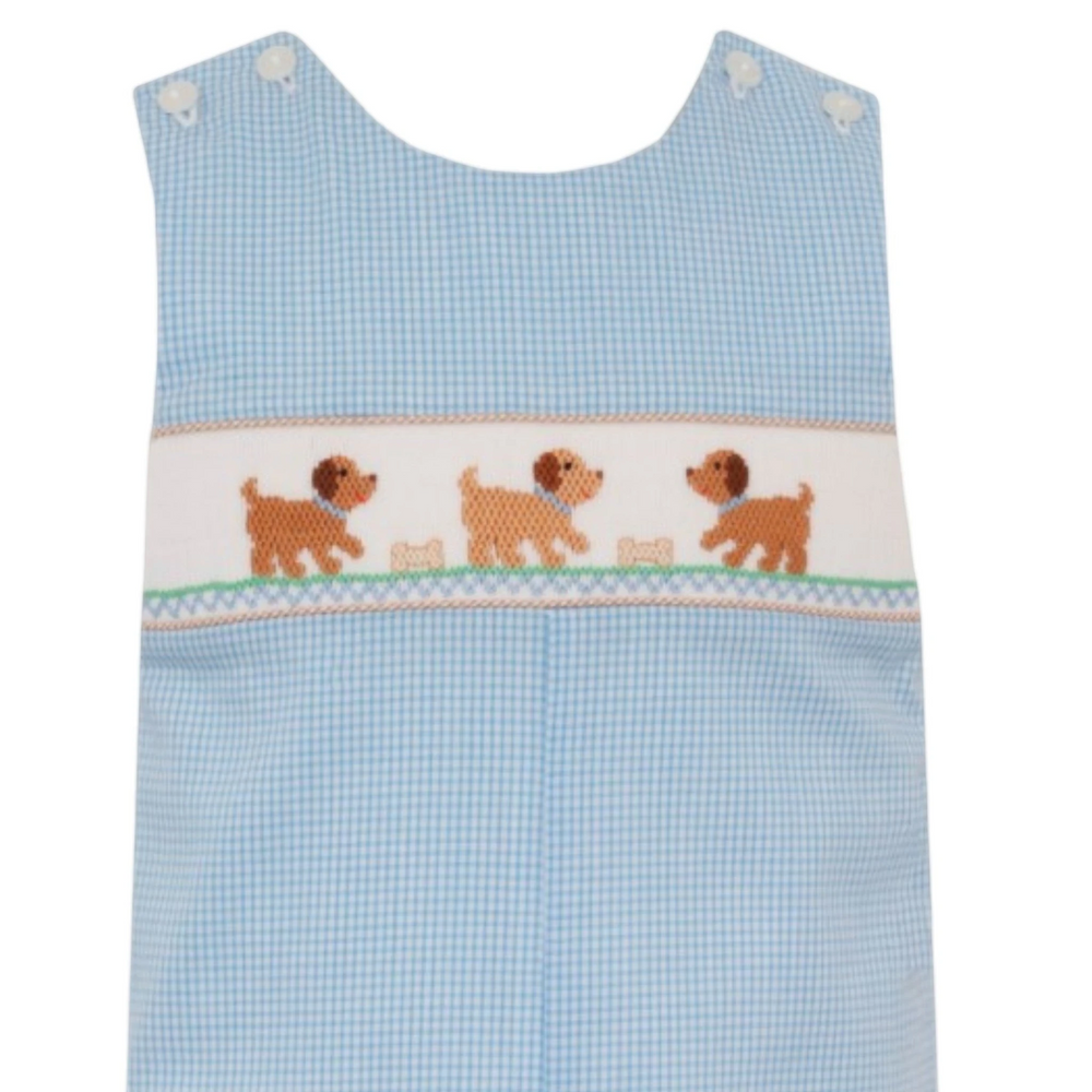 That Store light blue gingham long jon jon for boys featuring hand-smocked puppy embroidery and button shoulders.
