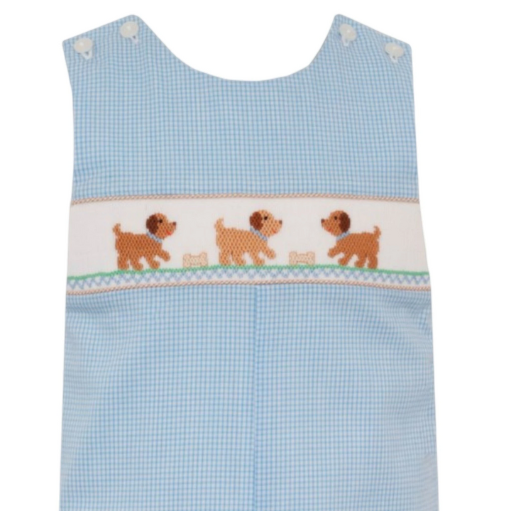 That Store light blue gingham long jon jon for boys featuring hand-smocked puppy embroidery and button shoulders.