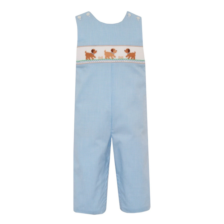 That Store light blue gingham long jon jon for boys featuring hand-smocked puppy embroidery and button shoulder straps.