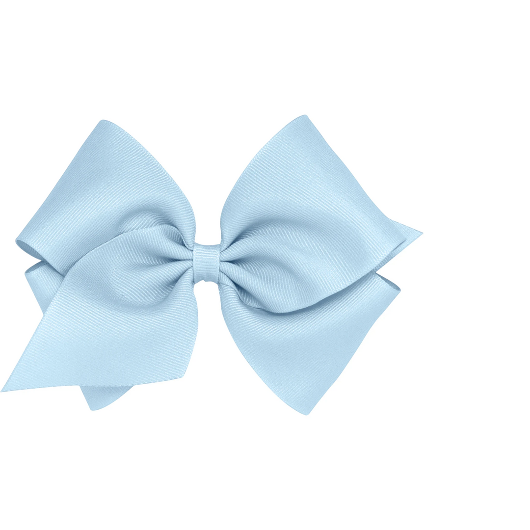 That Store small light blue grosgrain hair bow with a patented no-slip alligator clip for toddlers and girls.