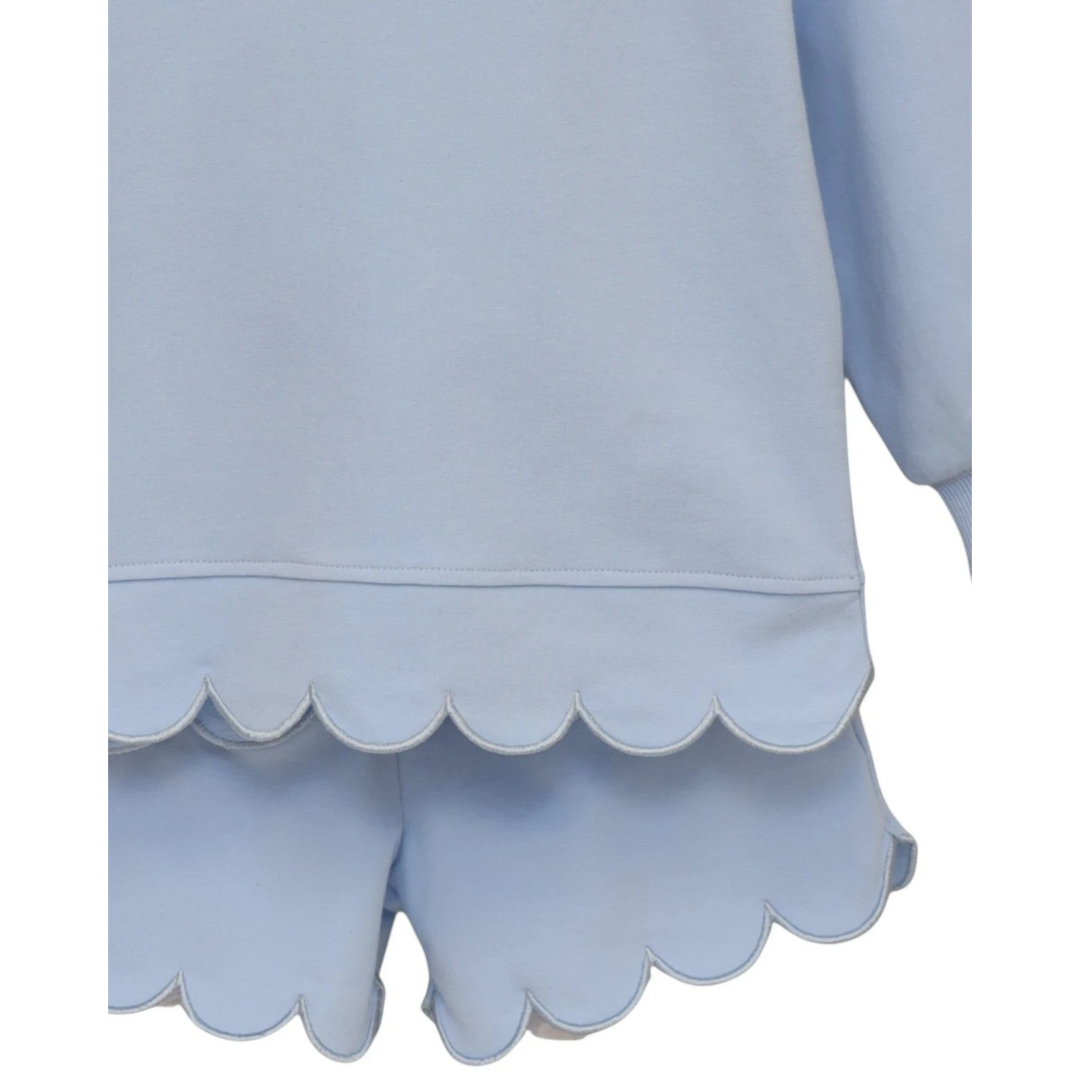 That Store light blue two-piece girls set with delicate scalloped hem details on the top and matching shorts