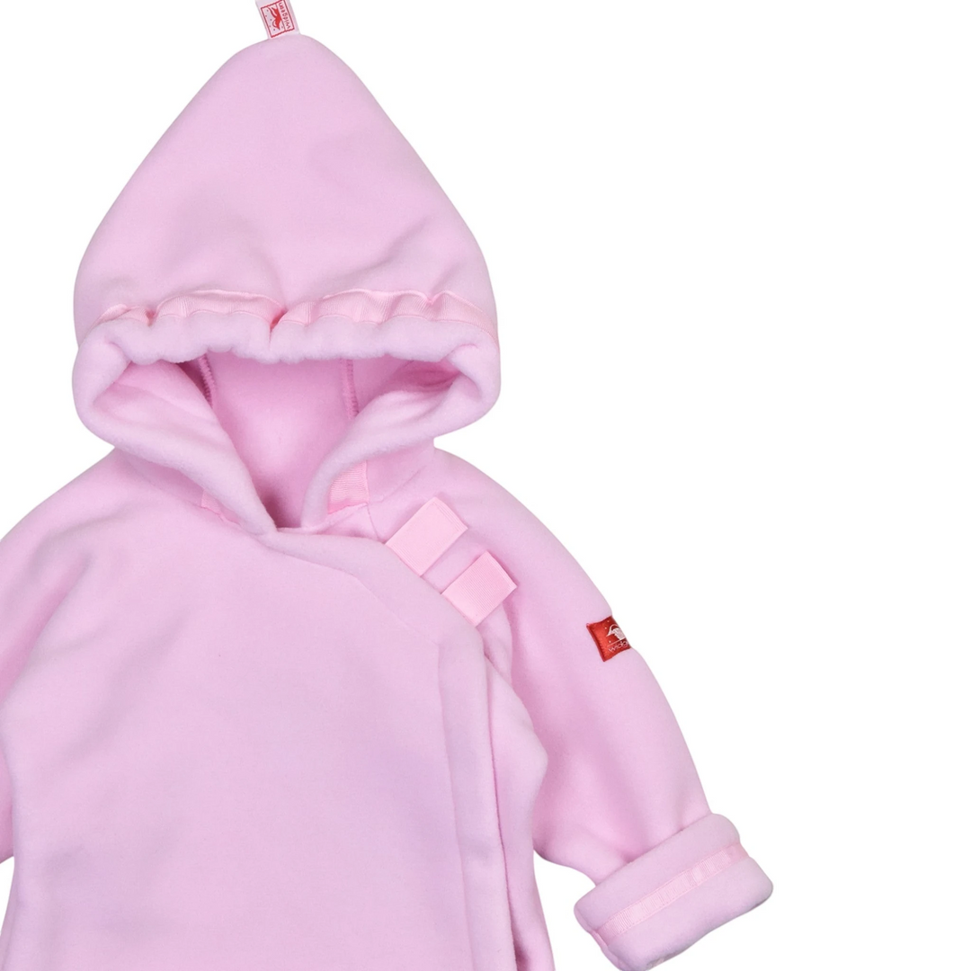 That Store light pink Polartec fleece infant jacket with a hood, Velcro closure, and adjustable grosgrain ribbon.