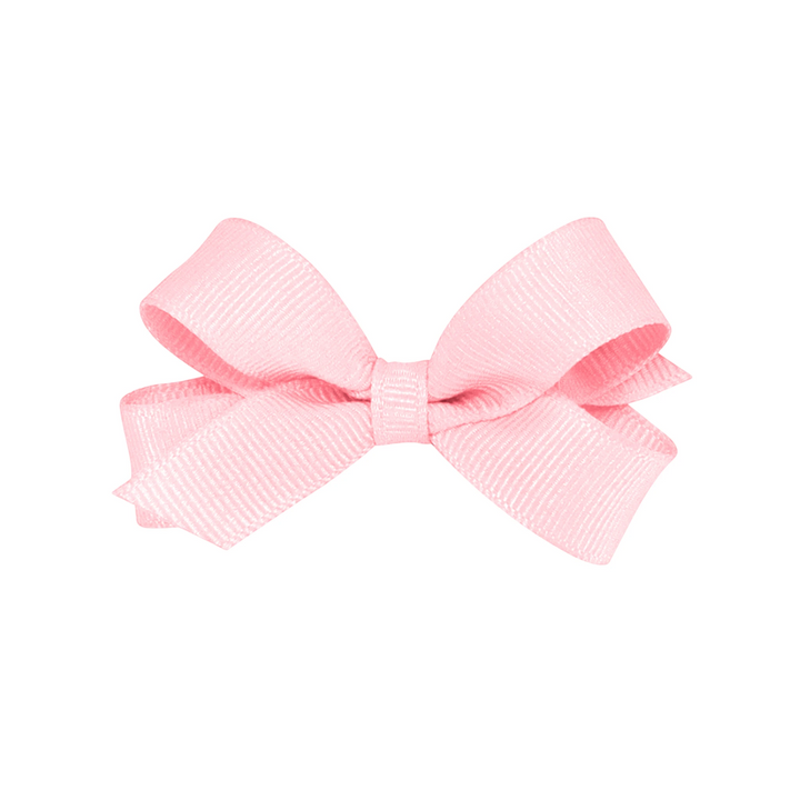 That Store light pink tiny grosgrain hair bow on a WeeStay no-slip alligator clip
