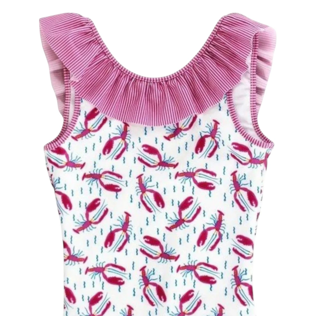 That Store J Bailey white one-piece swimsuit featuring a hot pink and blue lobster print with ruffled shoulder straps.