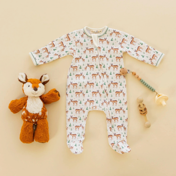 Luna &amp; Arlo ivory Pima cotton footie with woodland deer print, moss green trim, and front zip closure.