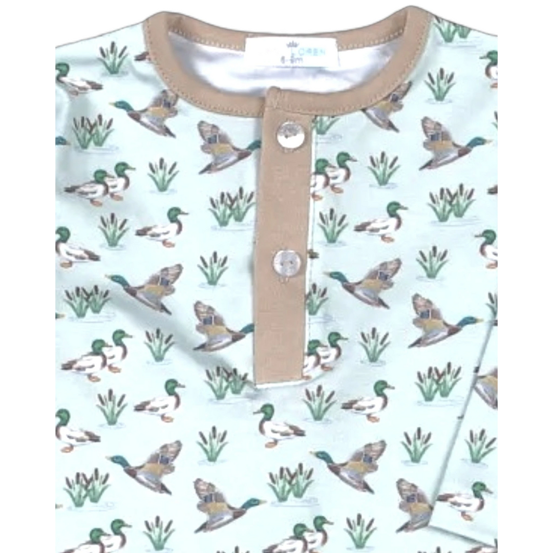 That Store boys romper in light green Pima cotton featuring a mallard duck print and a tan button-down neckline.