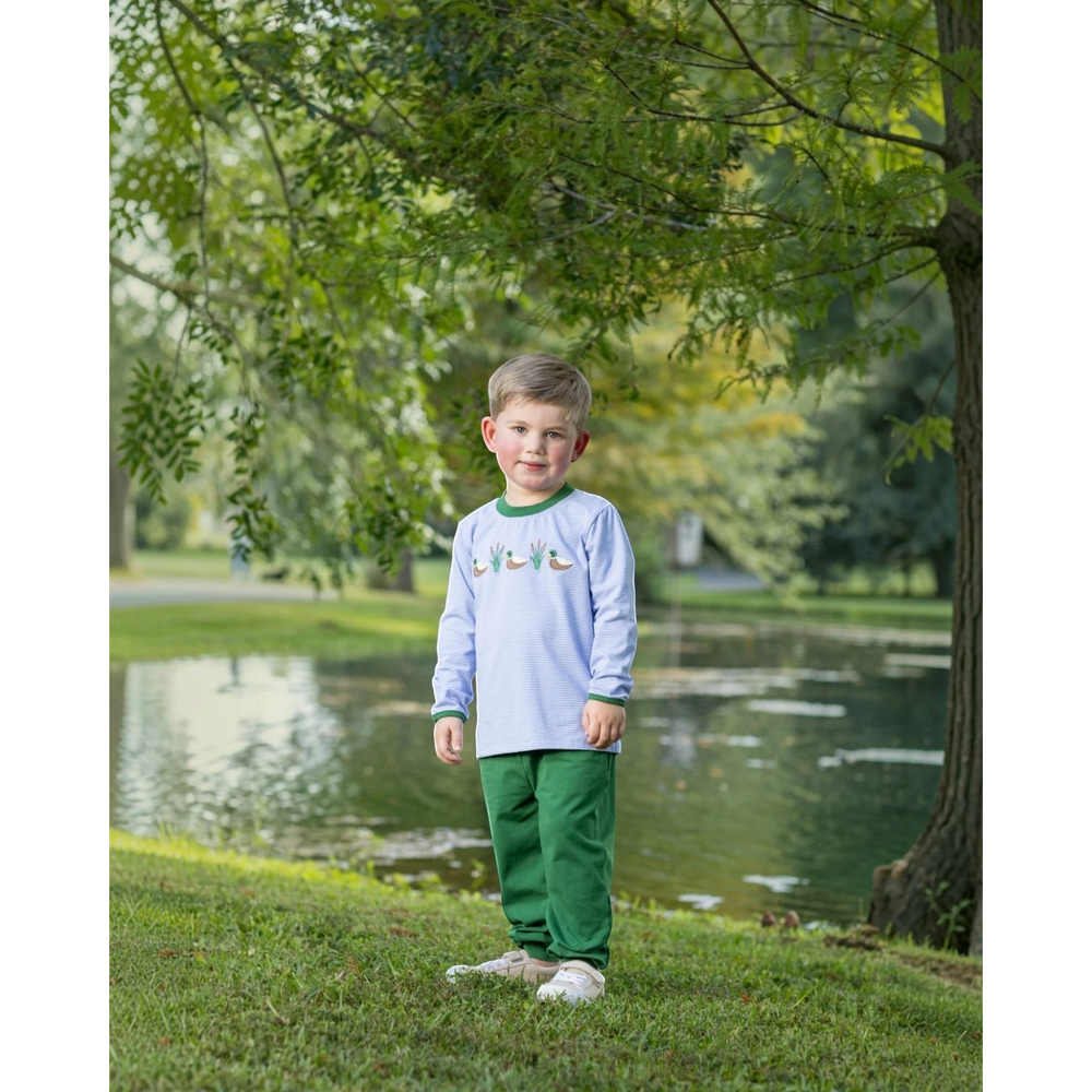 That Store boys blue stripe long sleeve shirt with mallard duck applique and green jogger pants in a park setting