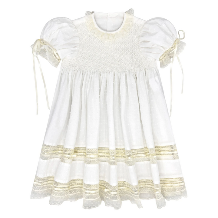 That Store Margaret white Swiss dot dress with ecru lace trim, puff sleeves, and smocked bodice for special occasions.