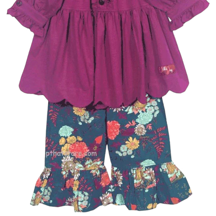 That Store Millie Jay cotton pant set with a purple ruffled peasant top and floral print pants with ruffled hems.