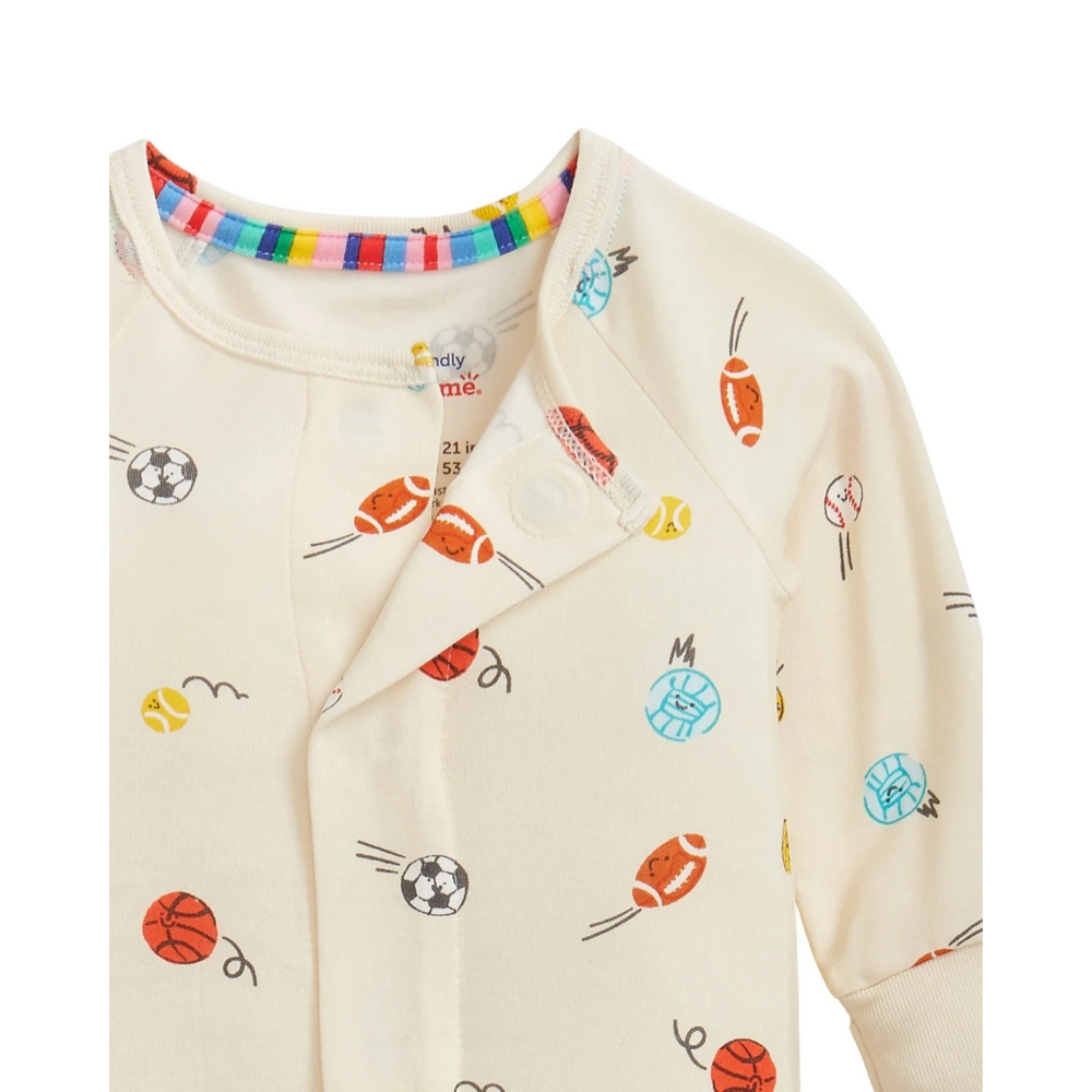 That Store Little Baller modal baby coverall with magnetic closures and colorful sports ball print on cream fabric.