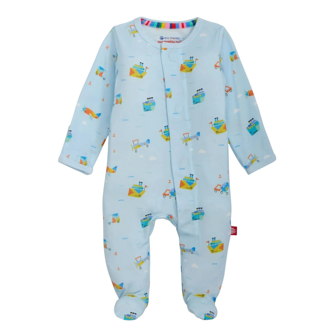 That Store light blue modal baby footie with colorful boat and plane print and magnetic closures for easy changes.