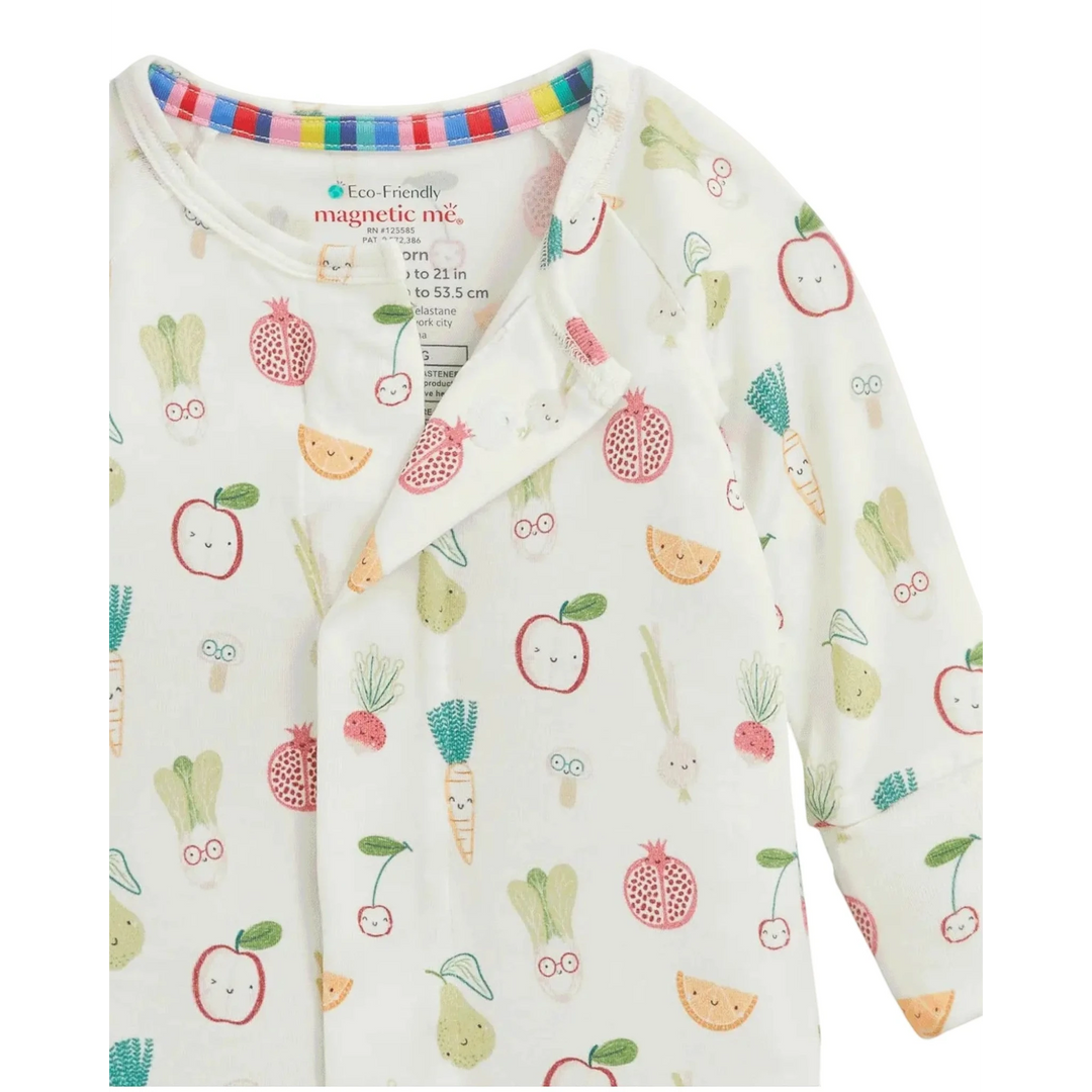 That Store baby coverall in white modal fabric with a colorful fruit and vegetable print and magnetic closures
