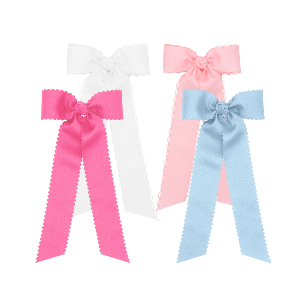 That Store Moonstitch Streamers hair bows in pink, white, and light blue with long ribbon tails and no-slip clips