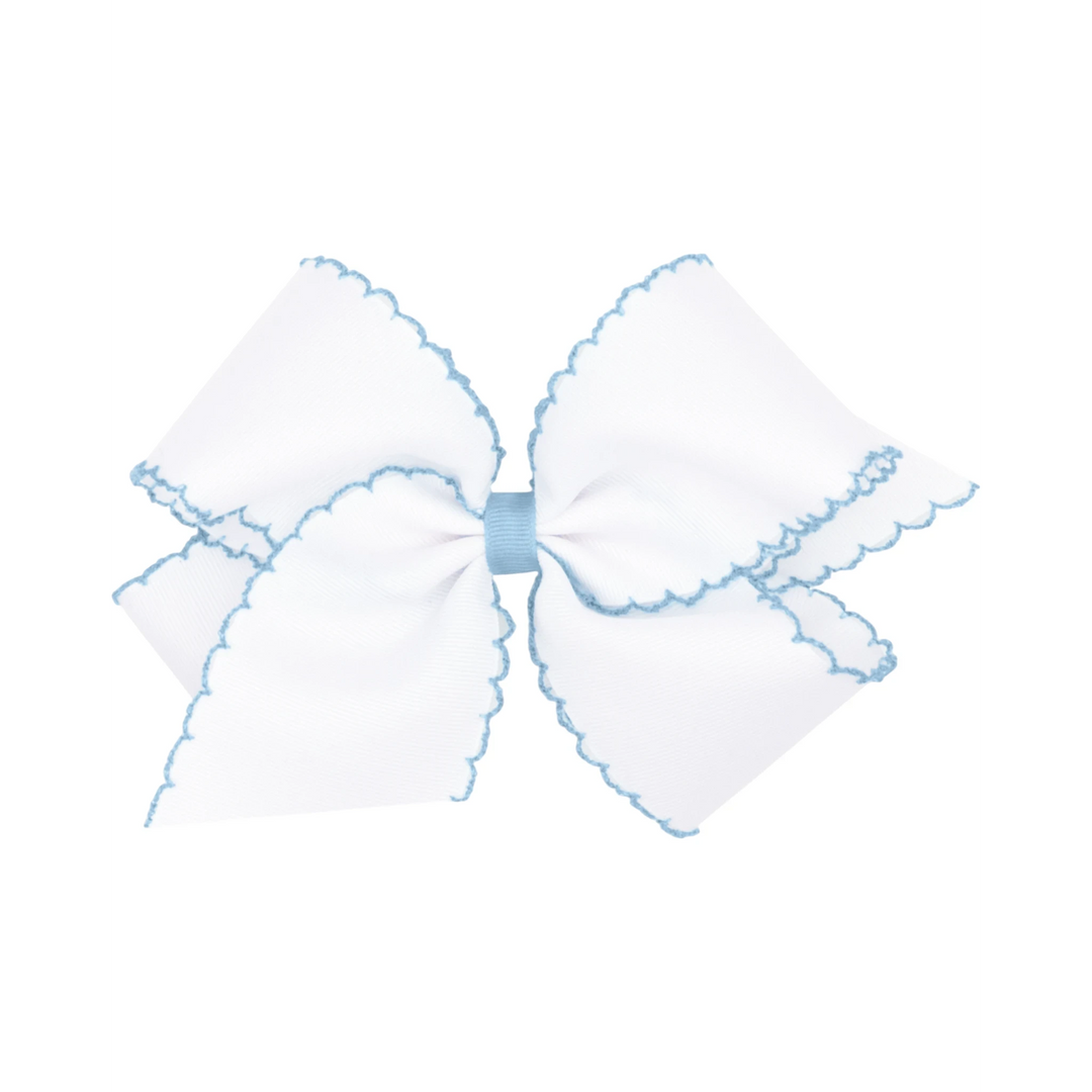 That Store Moonstitch medium white grosgrain hair bow with light blue scalloped edges and a no-slip hair clip
