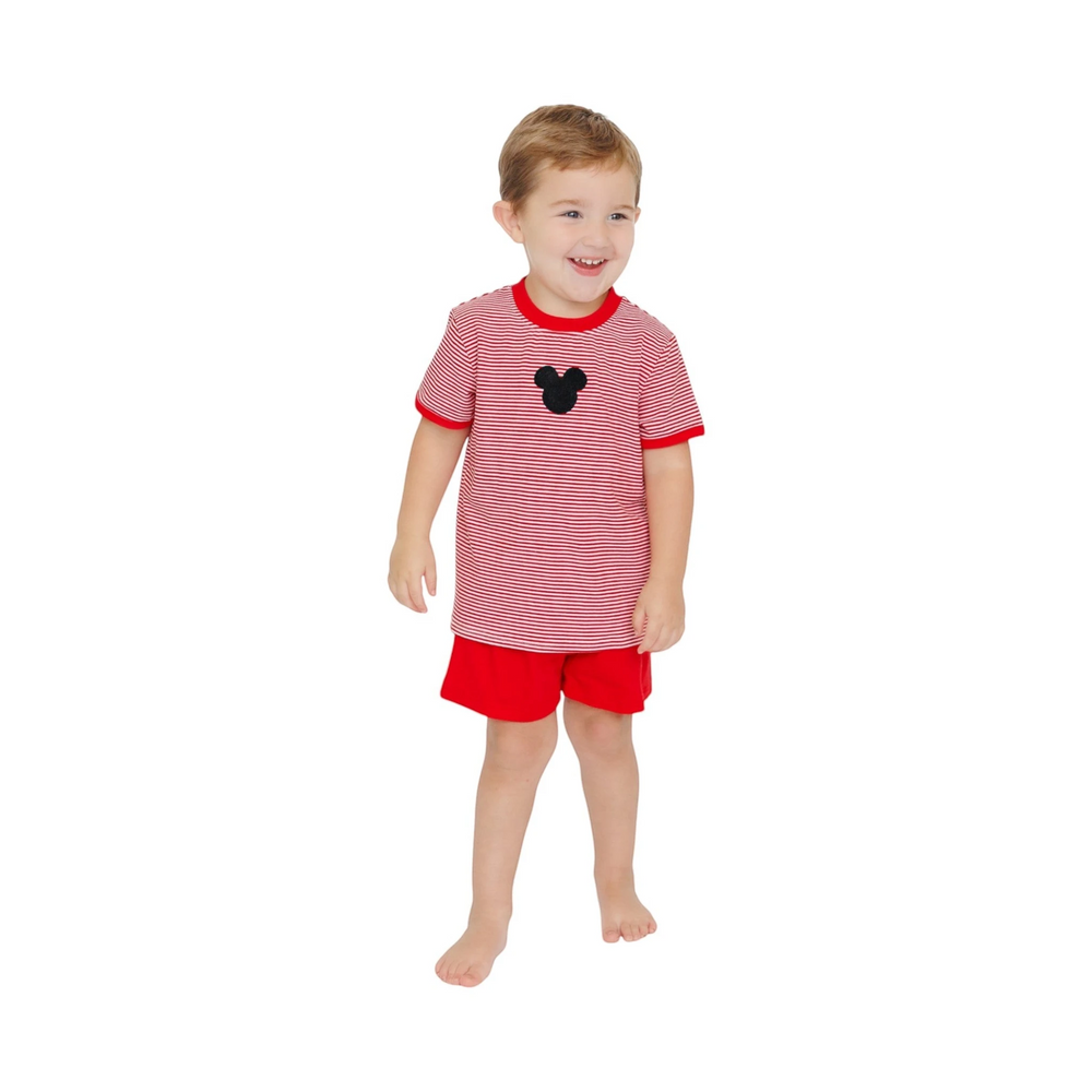 That Store toddler boy wearing a red and white striped short set with a black mouse applique for Disney vacations.