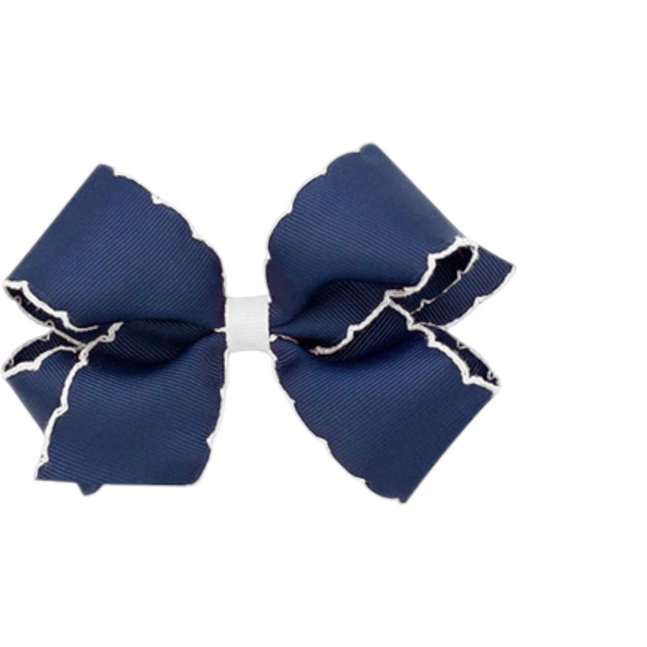 That Store Moonstitch medium navy blue grosgrain hair bow with contrasting white scalloped edges and no-slip clip
