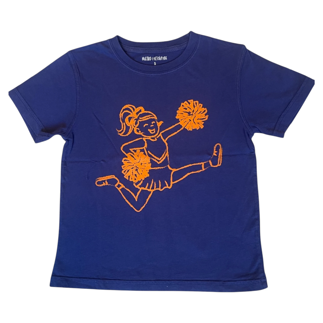 That Store navy blue short-sleeve cotton t-shirt featuring an orange graphic of a cheerleader with pom-poms.
