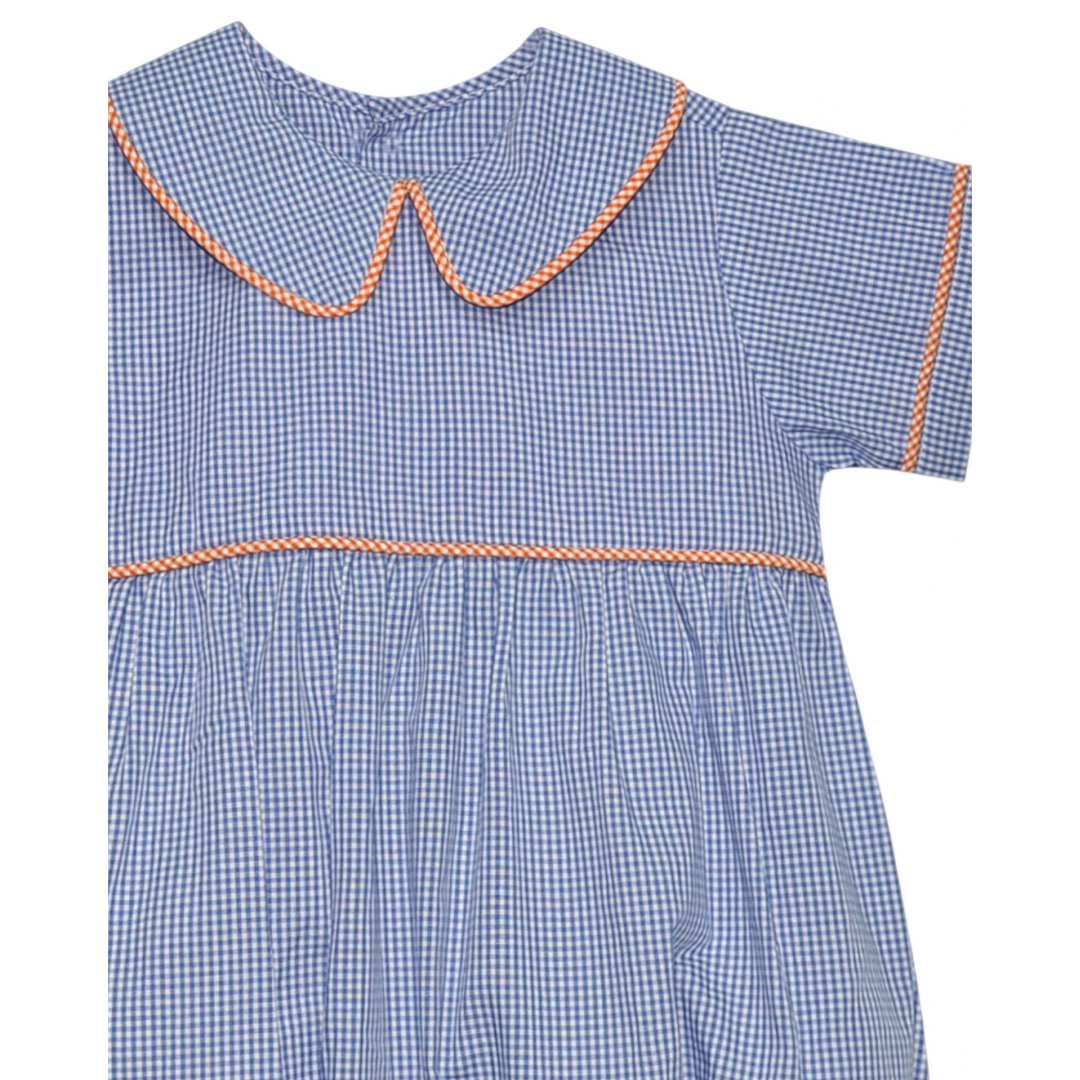 That Store boys bubble romper in navy and orange gingham with a Peter Pan collar and orange piping trim.