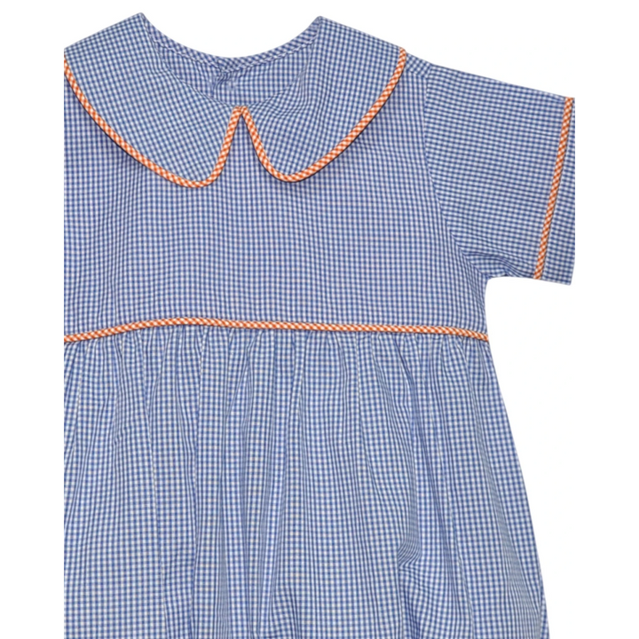 That Store boys bubble romper in navy and orange gingham with a Peter Pan collar and orange piping trim.