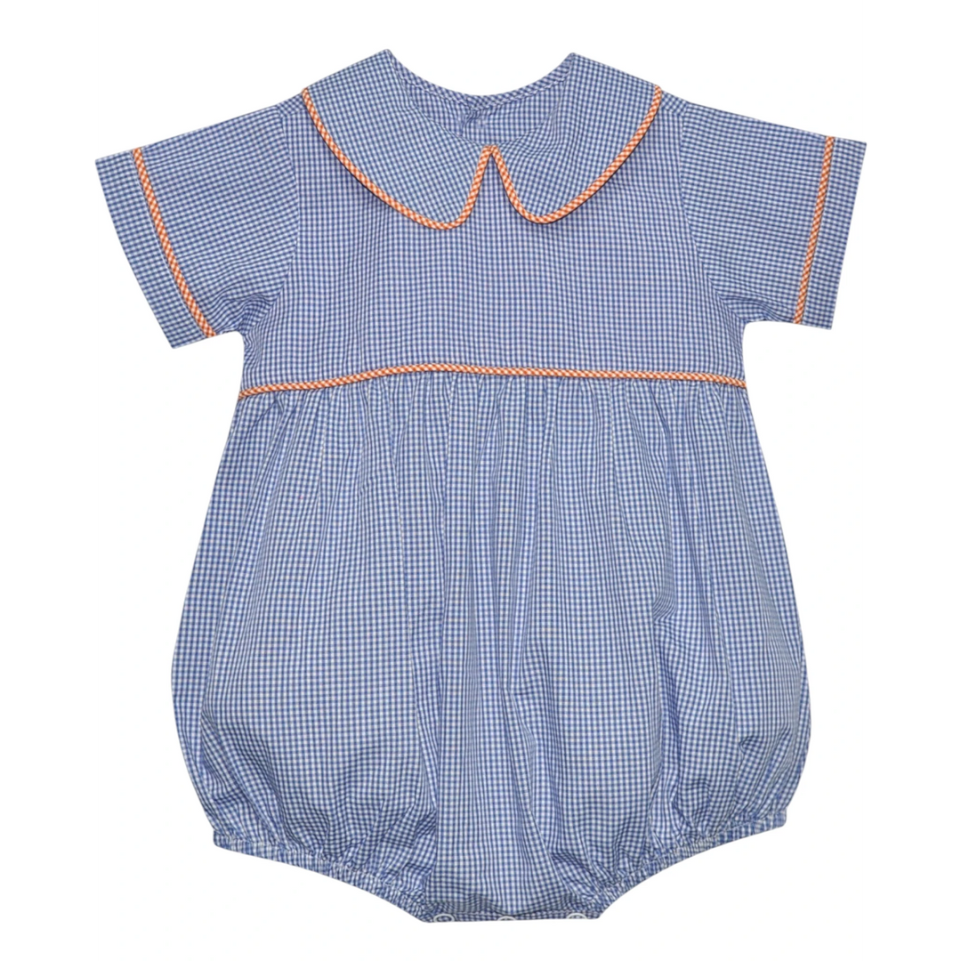 That Store boys bubble romper in navy and orange gingham with a peter pan collar and orange piping trim.