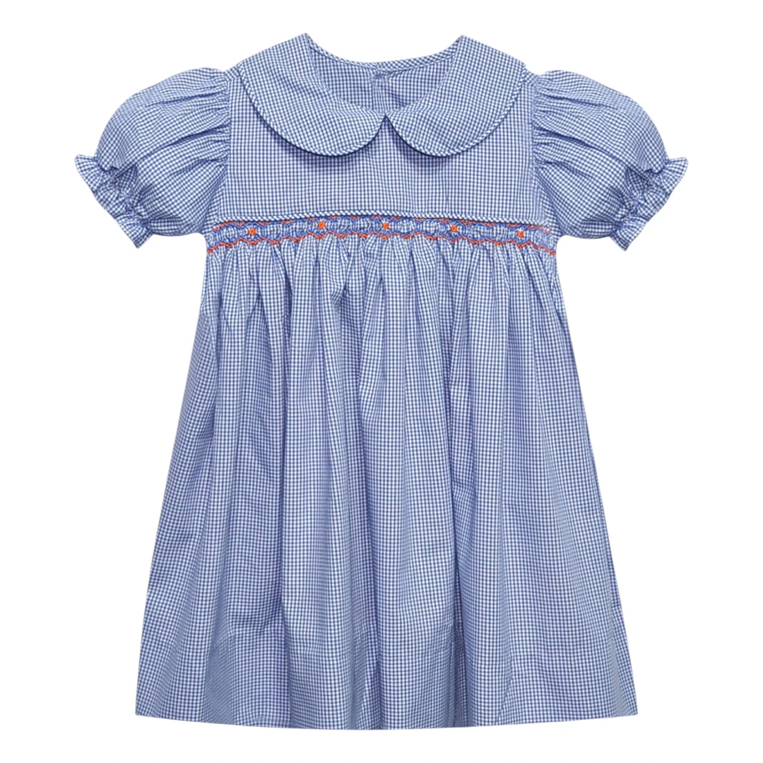 That Store navy and orange gingham smocked dress with a Peter Pan collar and puff sleeves for girls.