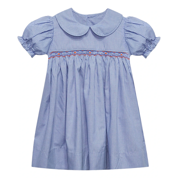 That Store navy and orange gingham smocked dress with a Peter Pan collar and puff sleeves for girls.