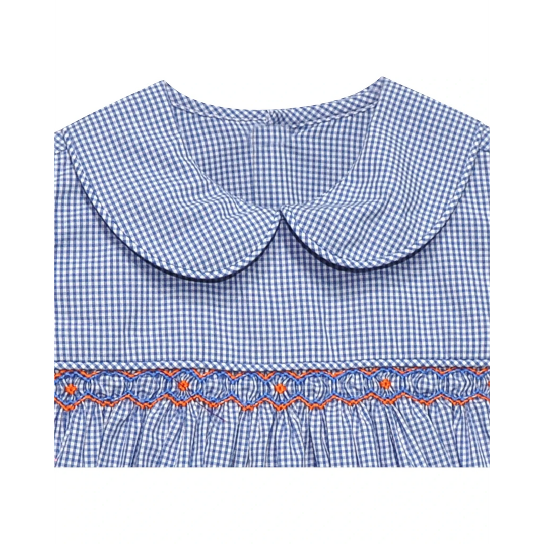 That Store navy and orange gingham smocked dress with a peter pan collar and geometric embroidery detail