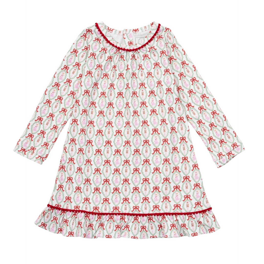 That Store Carlin girls' long sleeve pima cotton dress featuring a Nutcracker ballet print, ruffle hem, and pom pom trim