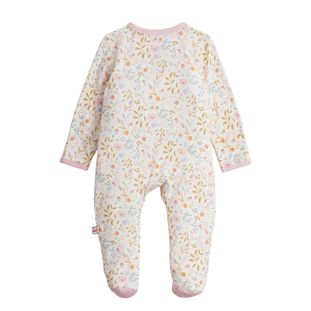 That Store Oinklet modal baby footie featuring a floral pig print with pink trim and long sleeves