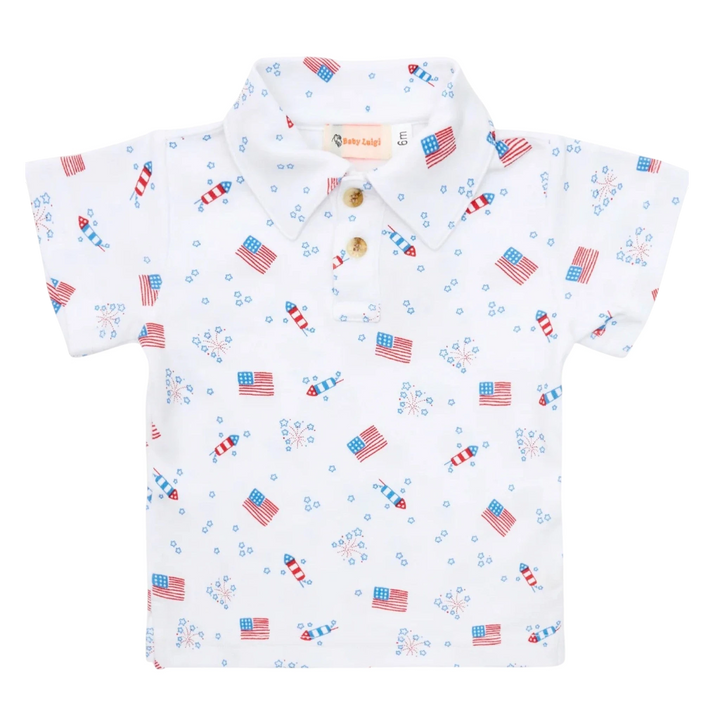 That Store boys polo shirt in white cotton with a patriotic red, white, and blue flag and fireworks print.