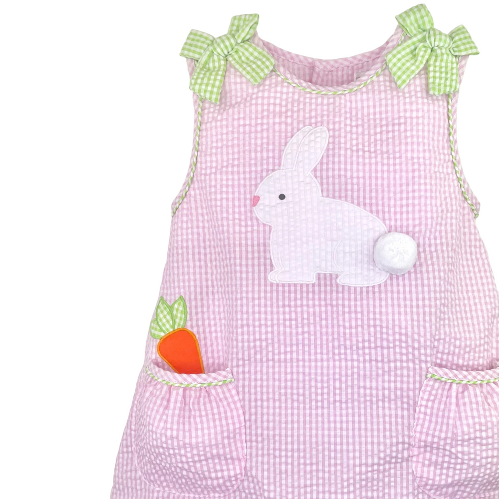 That Store pink seersucker gingham dress with bunny applique, carrot pocket detail, and lime green shoulder bows.