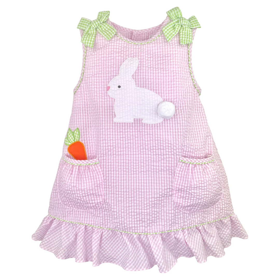 That Store pink seersucker gingham dress with bunny applique, carrot pocket detail, and lime green shoulder bows.