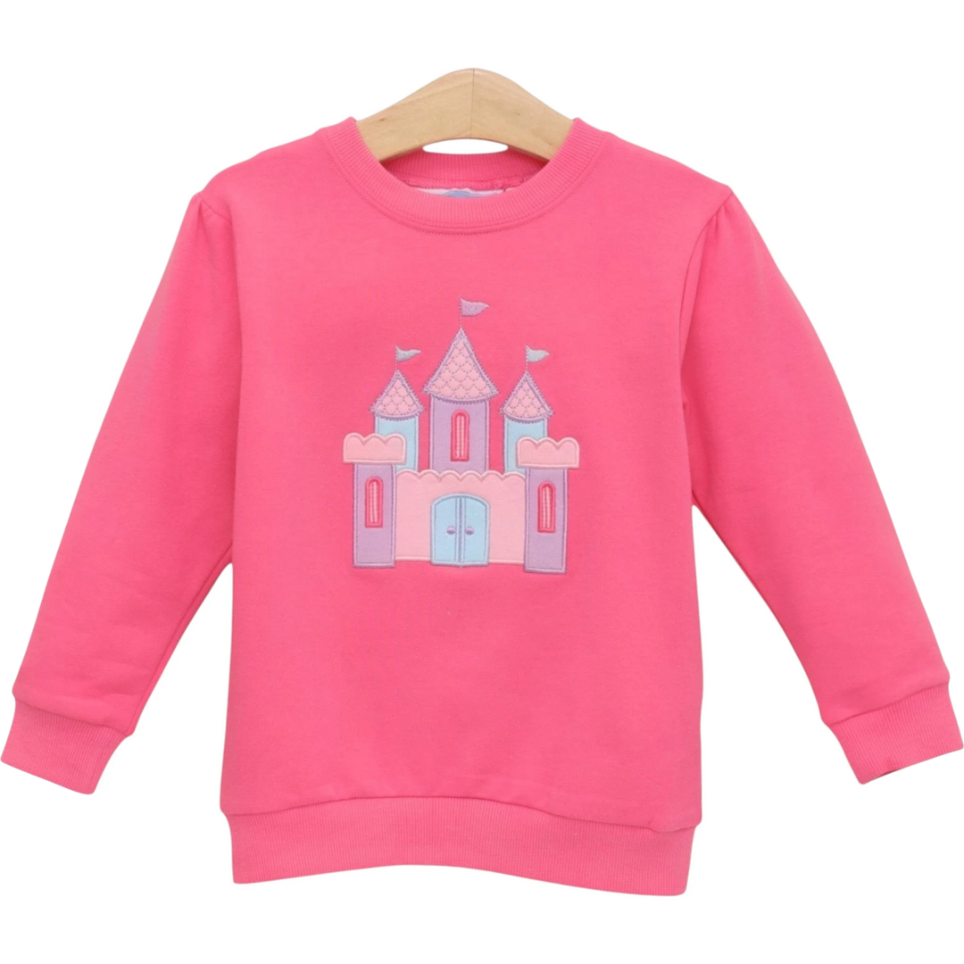 That Store pink French terry girls pullover featuring a whimsical embroidered castle design on the front