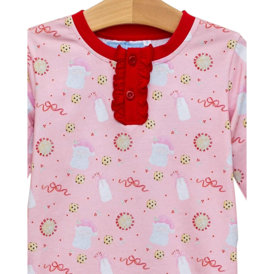 That Store pink cotton lounge set with festive Santa, milk, and cookie print and red ruffle button placket
