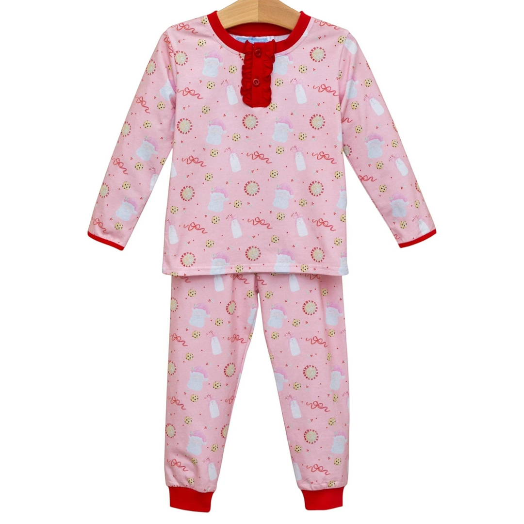 That Store Milk & Cookies girls' pink cotton lounge set with festive Santa and cookie print and red ruffle trim.