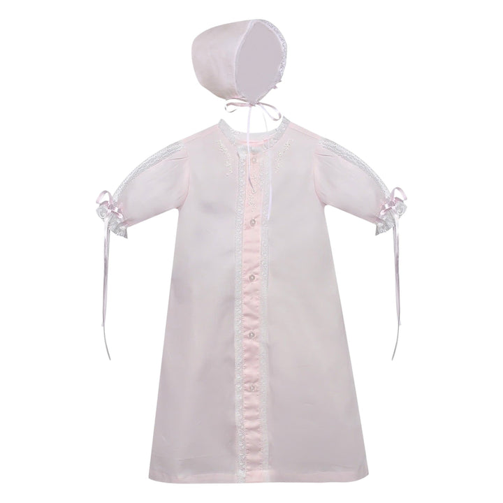 That Store blush pink baby girl daygown with floral embroidery, white lace trim, and a matching bonnet.