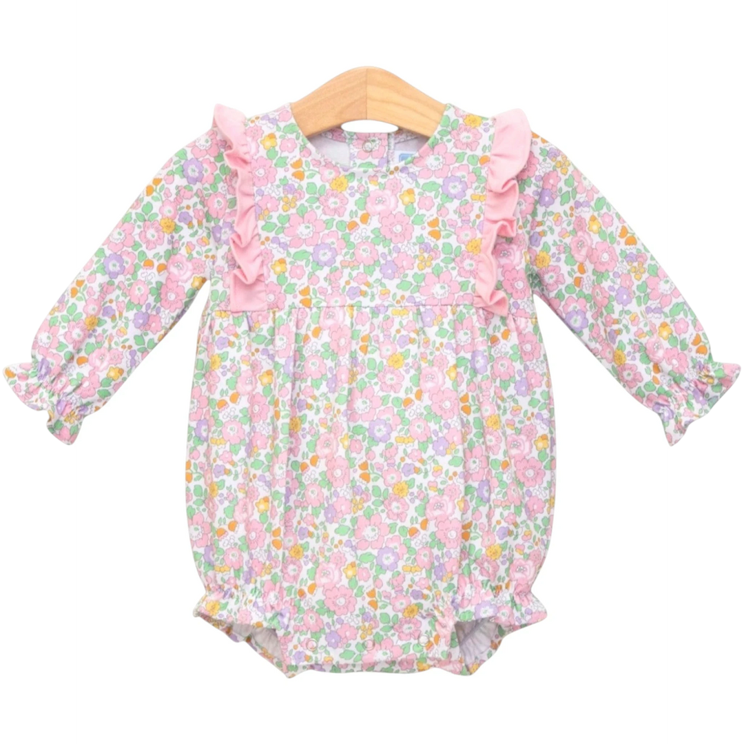 That Store pink floral bubble romper for girls with ruffled shoulders and long sleeves in soft cotton blend fabric.