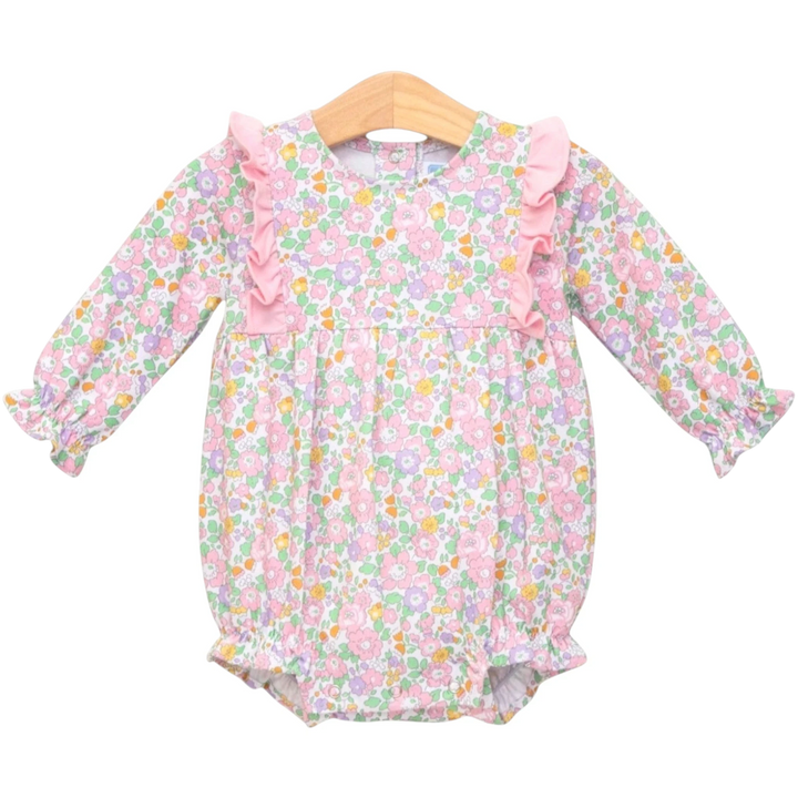 That Store pink floral bubble romper for girls with ruffled shoulders and long sleeves in soft cotton blend fabric.