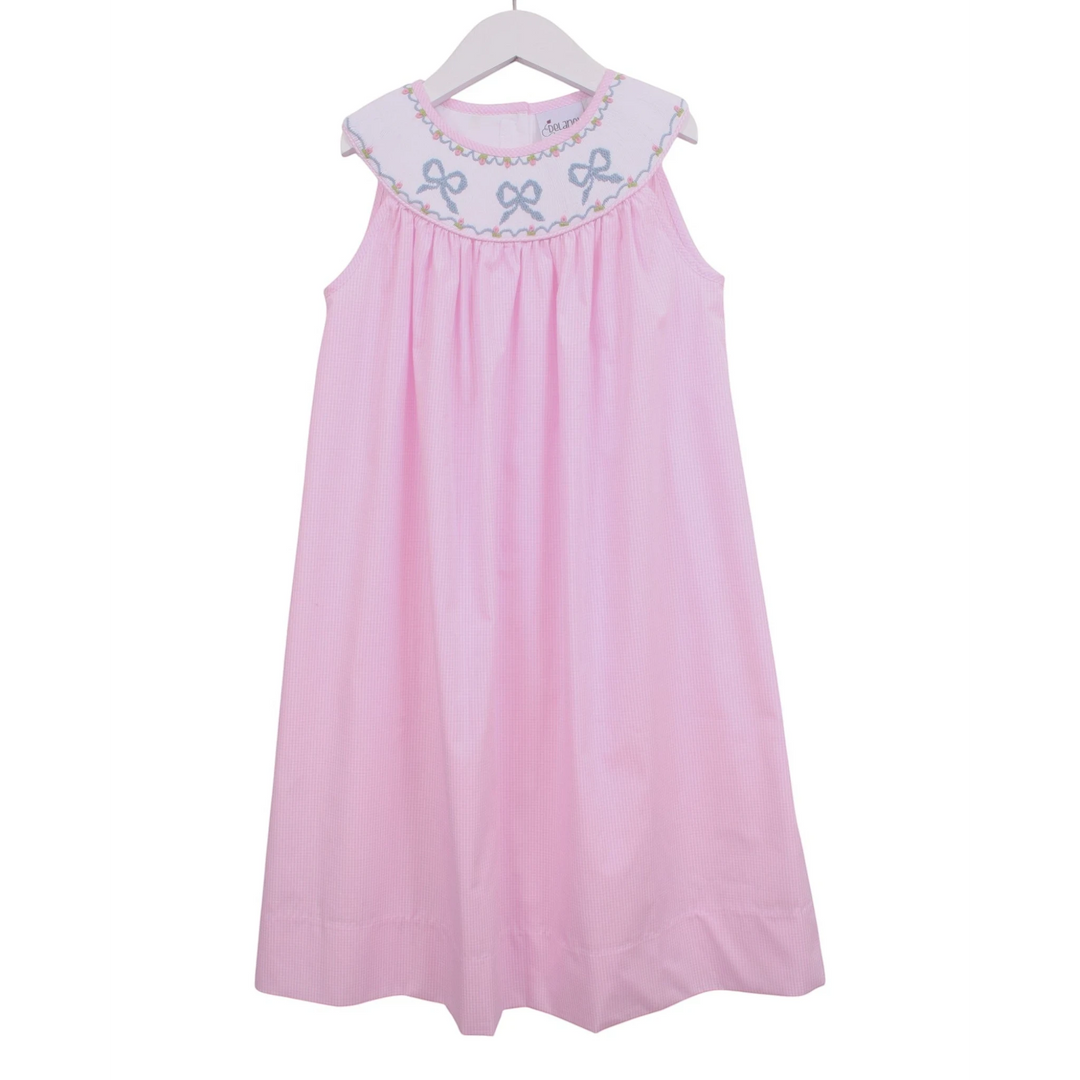That Store pink gingham sleeveless dress with a smocked yoke featuring embroidered blue bow details on a white collar