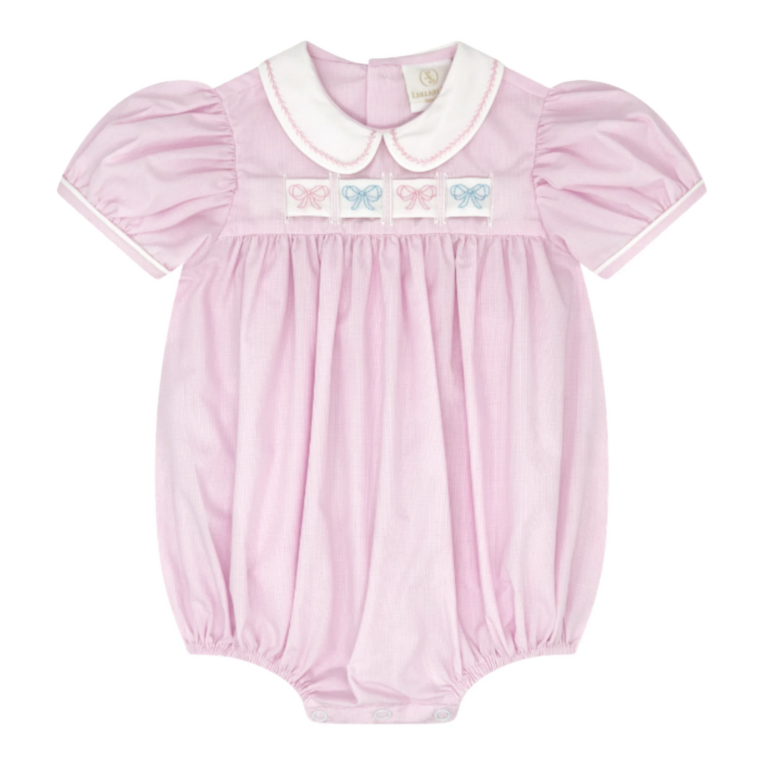 That Store pink mini gingham bubble romper with white Peter Pan collar and interchangeable ribbon bow embroidery